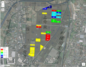 タンパク質含有率別に色分けされた田んぼの上空写真